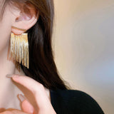 curved tassel earrings
