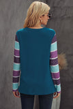 striped sleeve twist front top with sequined pocket