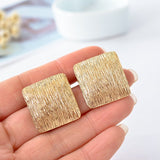 contracted geometric square clip earrings