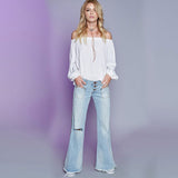 low waist flare multi button ripped jean